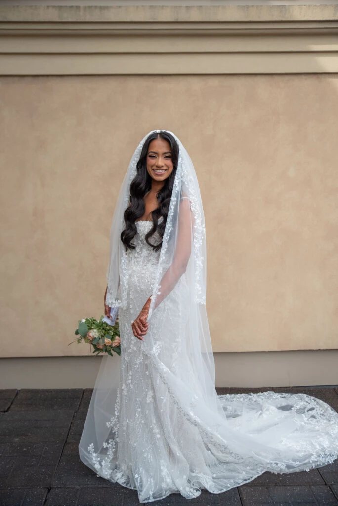 Real bride Shaban posing in her wedding gown