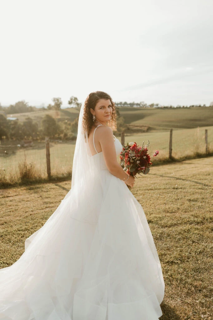 Real Stella York Bride Holly posing in her wedding dress