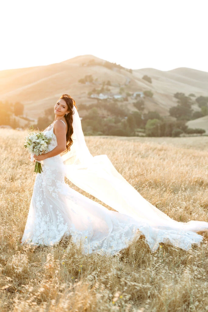 Real Bride Anika posing in her wedding dress