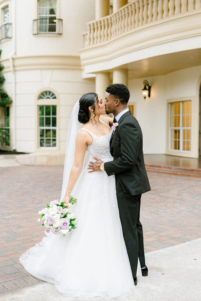 Real Bride Antonia and Pierry embracing each other
