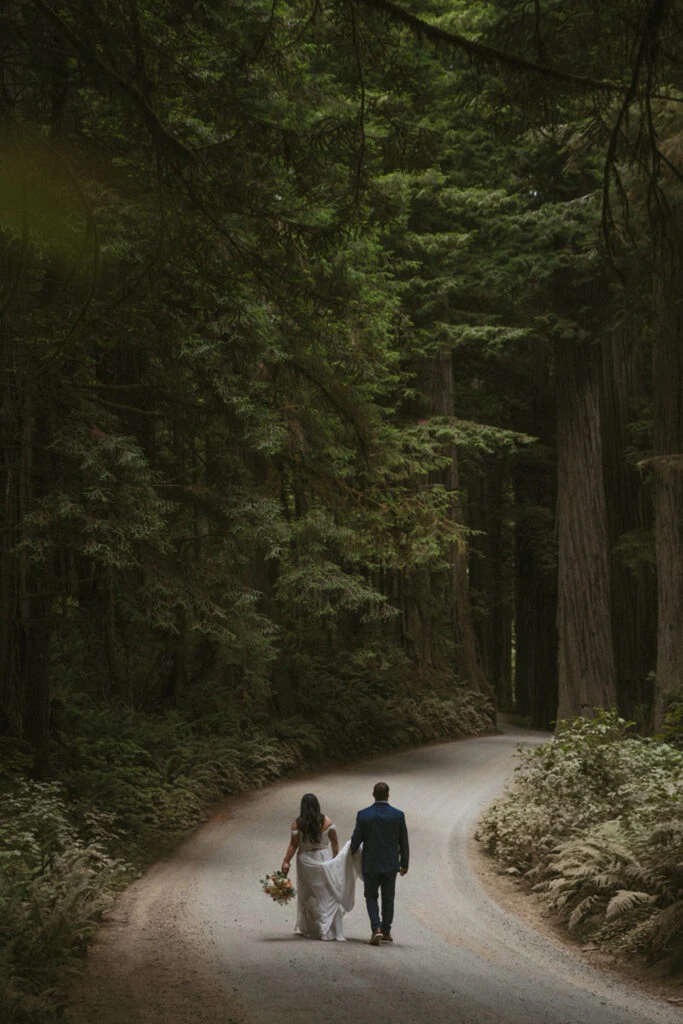 Real Bride Teresa and Eric walking in the Redwood National Park