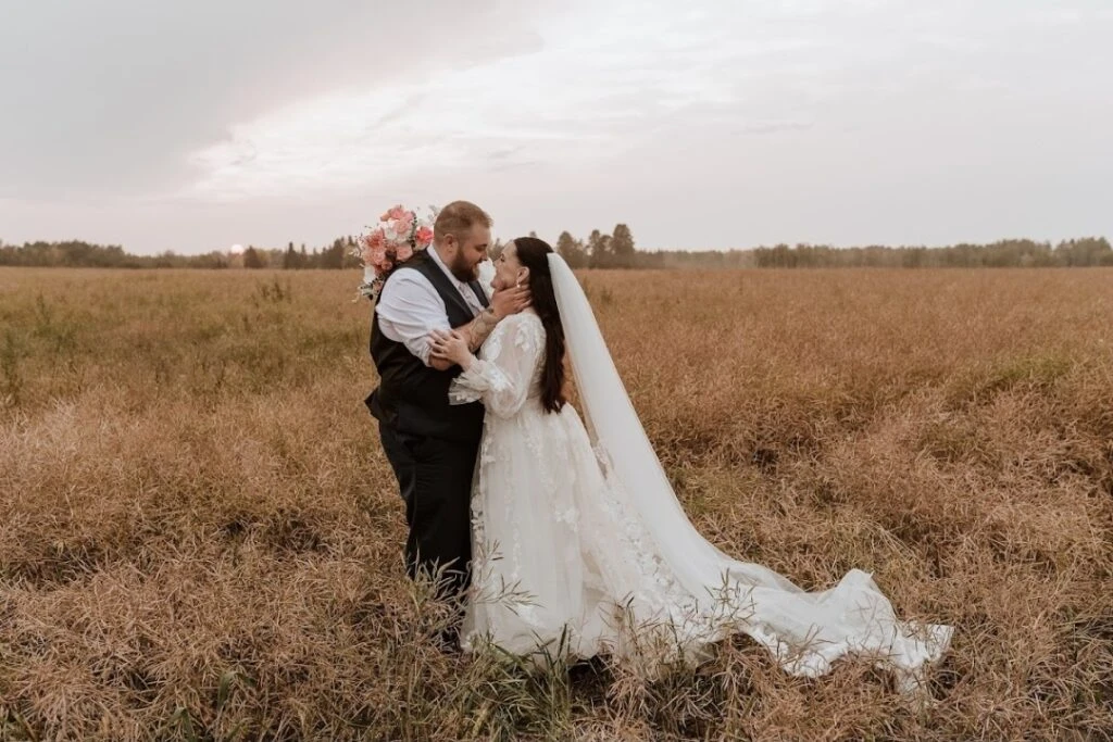 Real bride Kylie posing with her husband