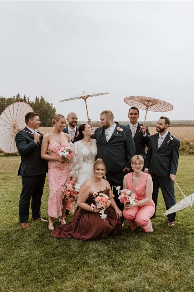 Real bride posing with her wedding party