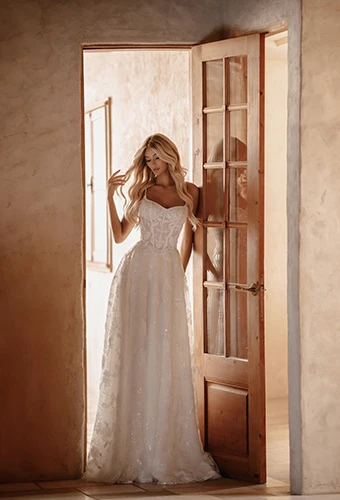 Bride wearing beaded floral a-line wedding dress, Martina Liana ML2032