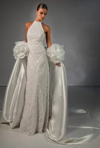 Bride wearing halter neck column wedding gown featuring beaded lace, satin topper and 3D floral details, Martina Liana Luxe LE1481