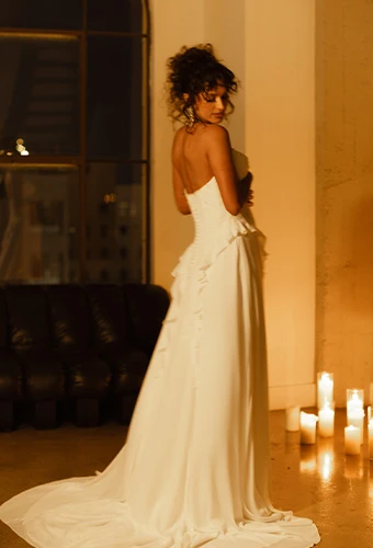Bride wearing strapless faux two piece wedding dress