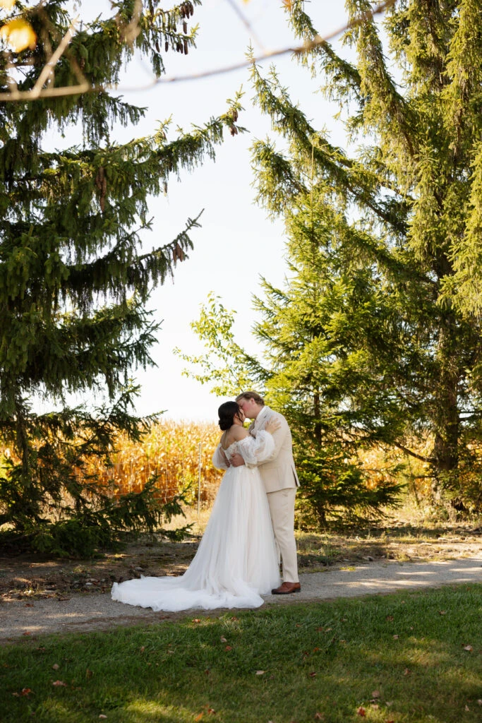 Real bride Emily posing with her husband