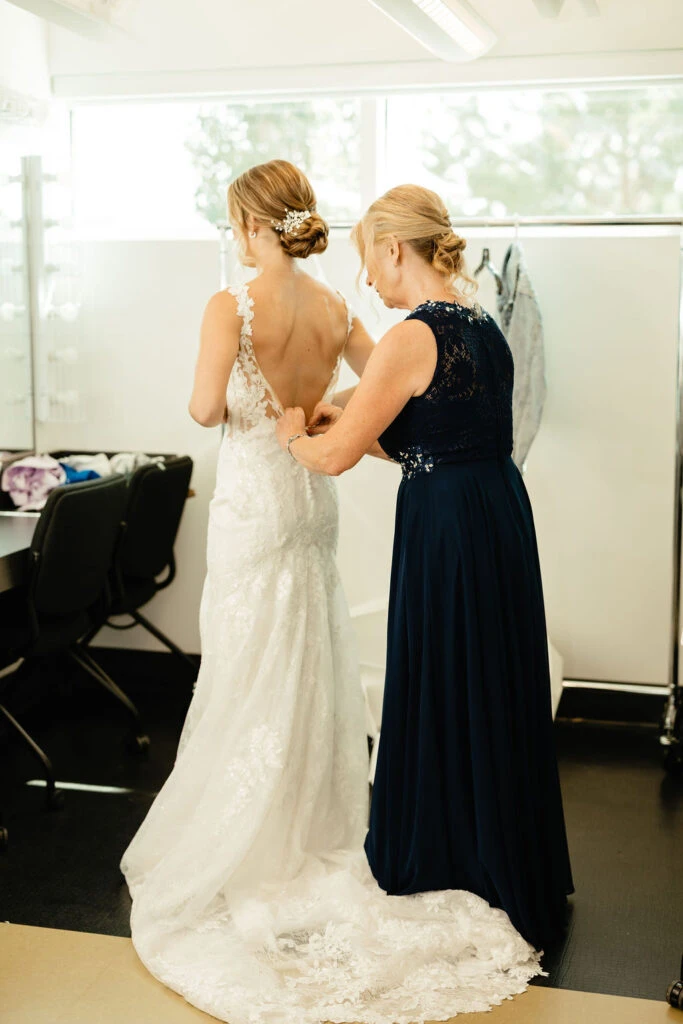 Real bride getting ready in her wedding gown