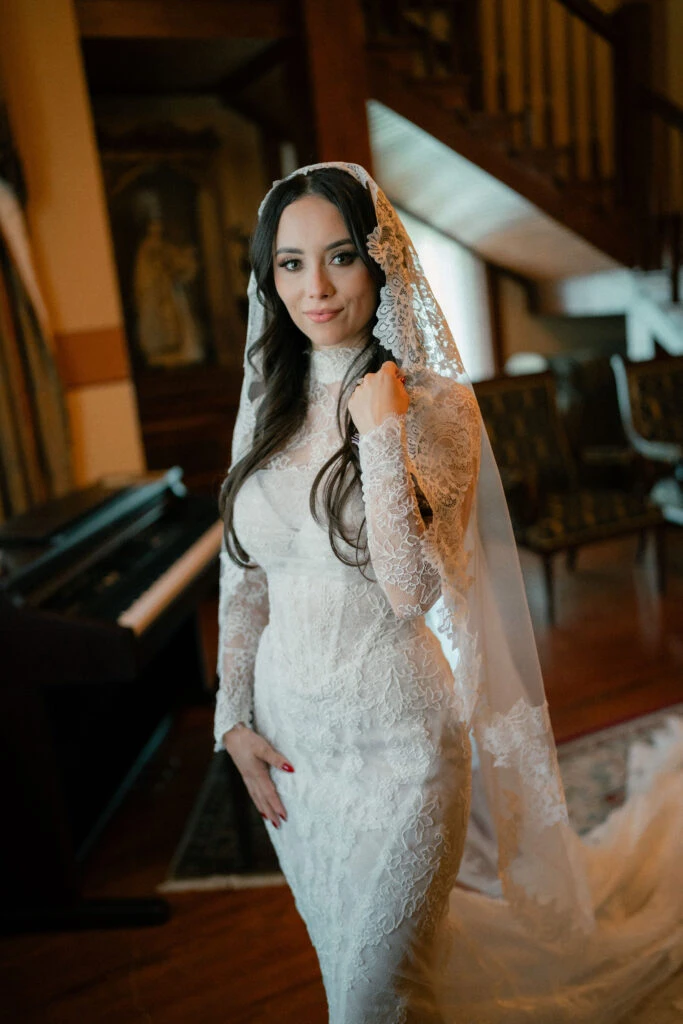 Real bride Lexie posing in her wedding gown