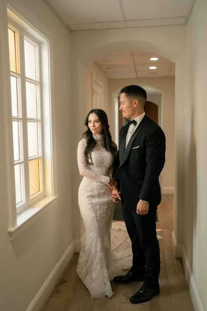 Real bride Lexie posing with her husband