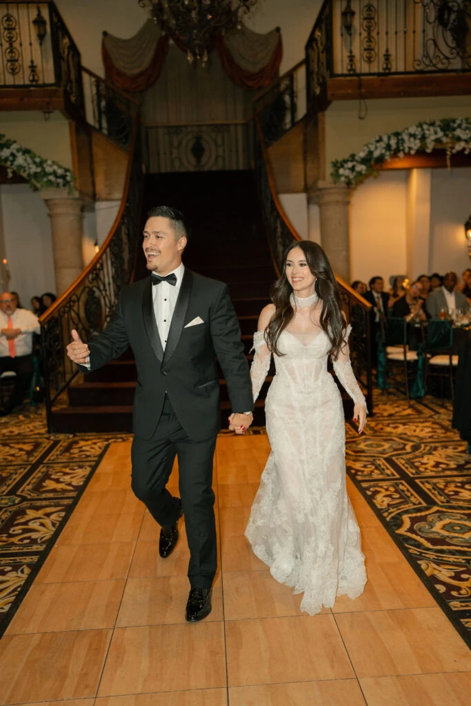 Real bride Lexie celebrating with her husband