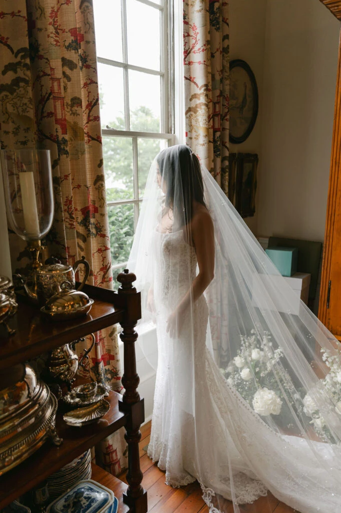 Real bride LauraLeigh posing in her wedding gown