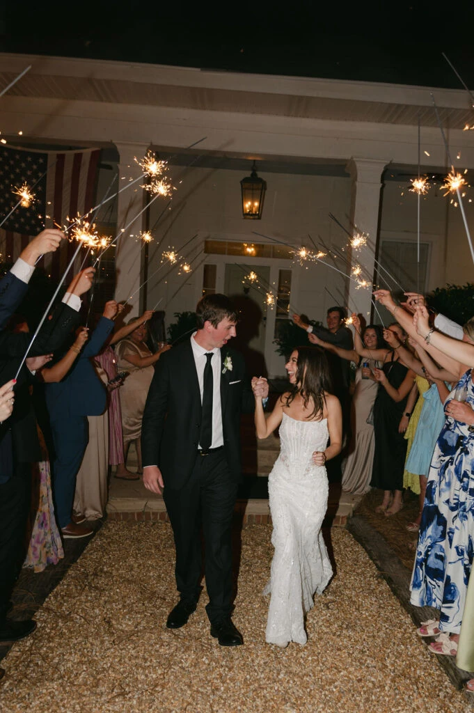Real bride LauraLeigh celebrating with her husband