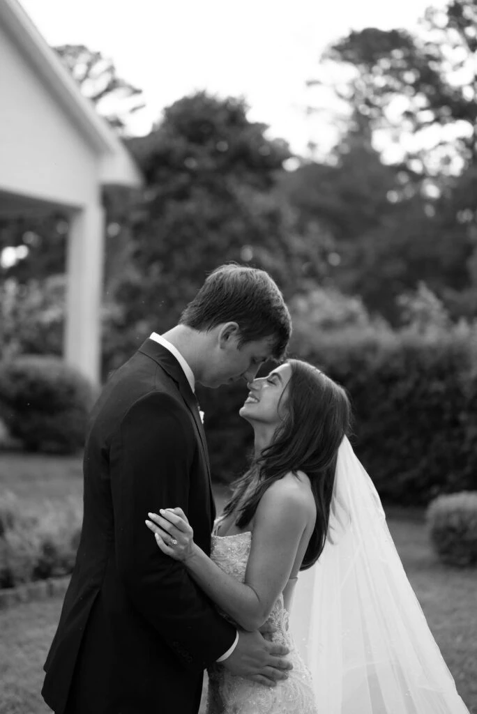 Real bride LauraLeigh embracing her husband
