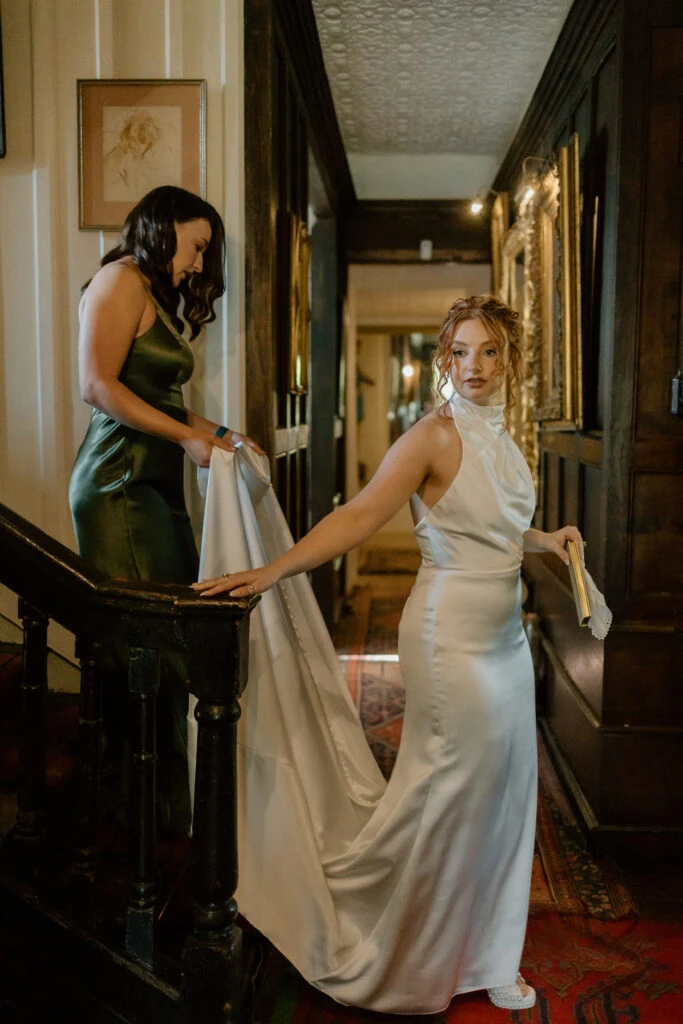 Real bride Savannah walking in her wedding gown