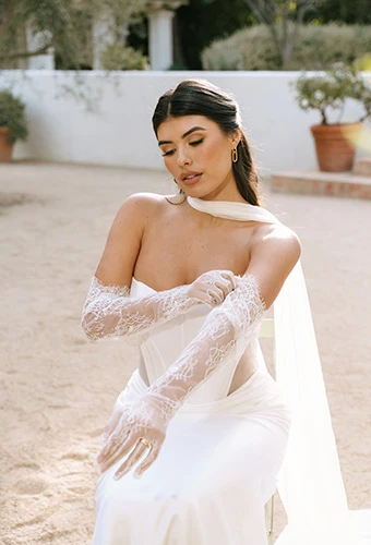 Bride wearing romantic column wedding dress with lace bridal gloves, Stella York sy8161