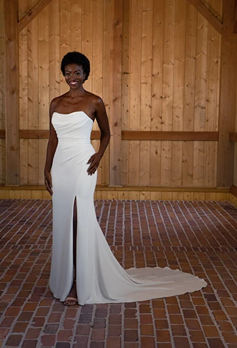 Bride wearing simple strapless column gown with pleated and draped bodice, Essense of Australia D3634