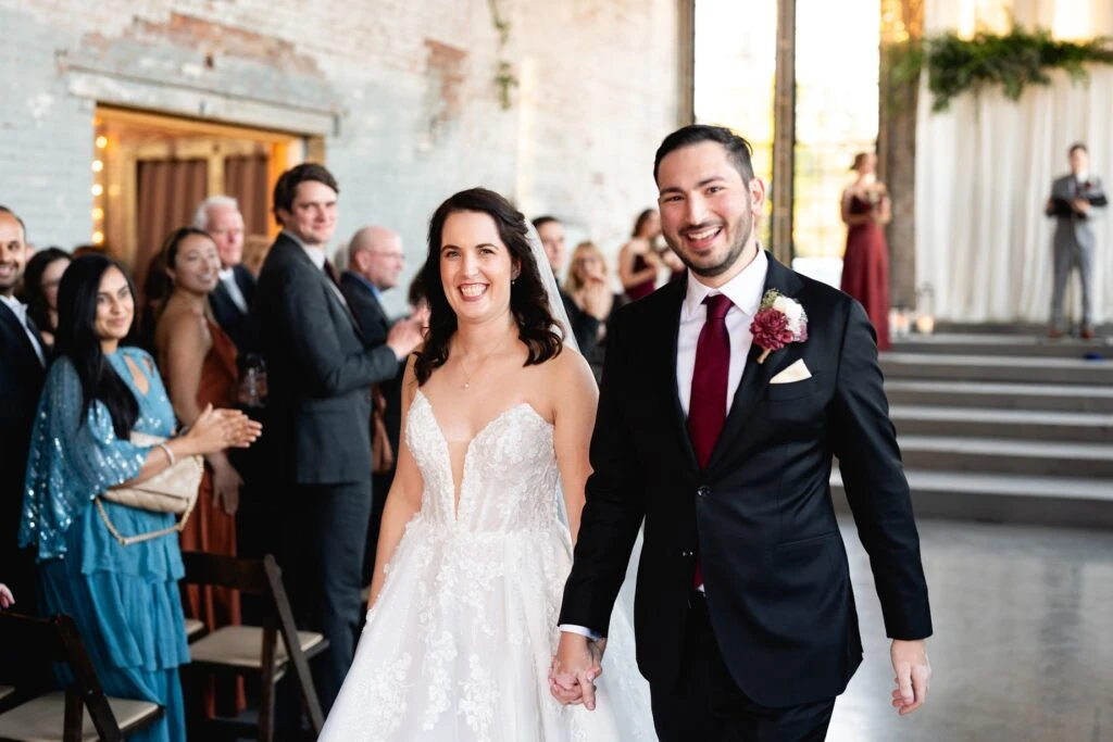 Real bride Melissa during her ceremony with her husband