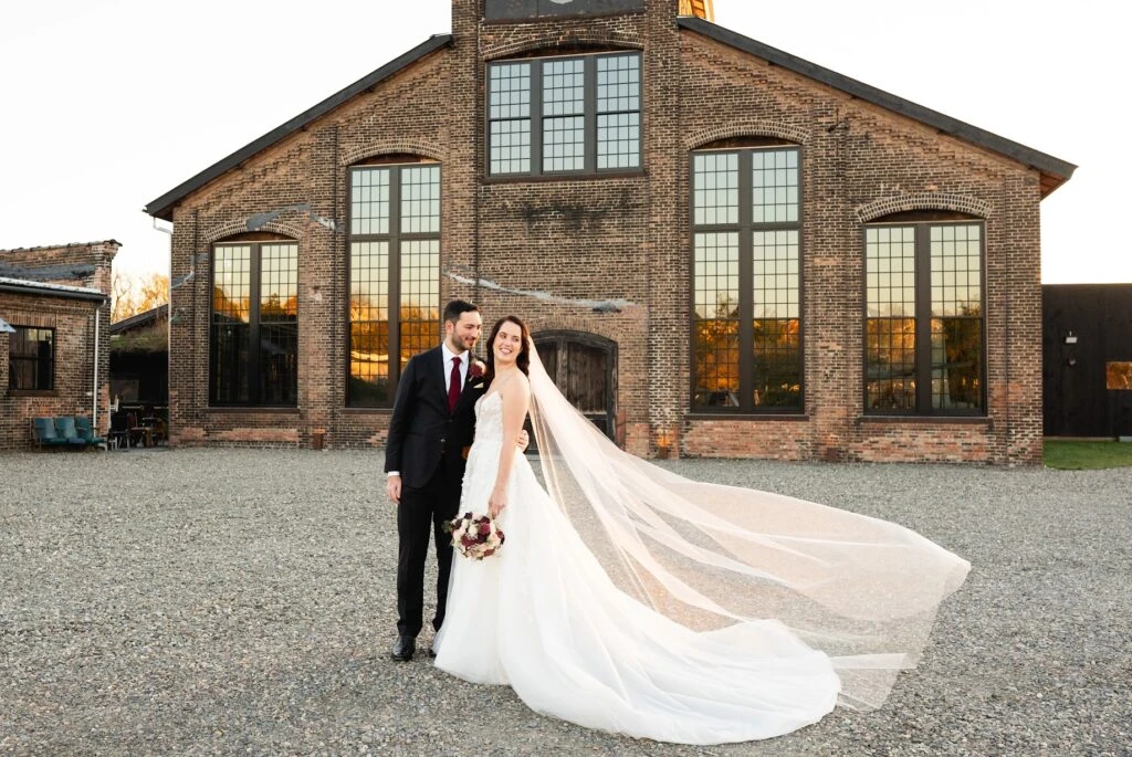 Real bride Melissa posing with her husband