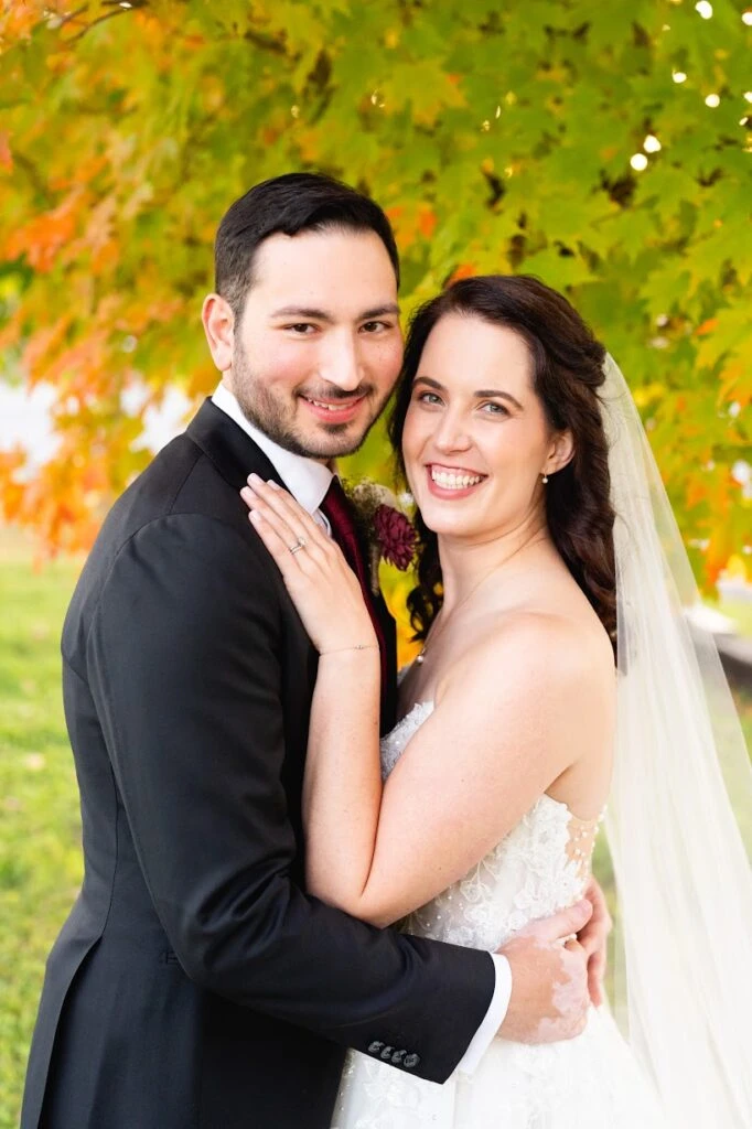 Real bride Melissa posing with her husband