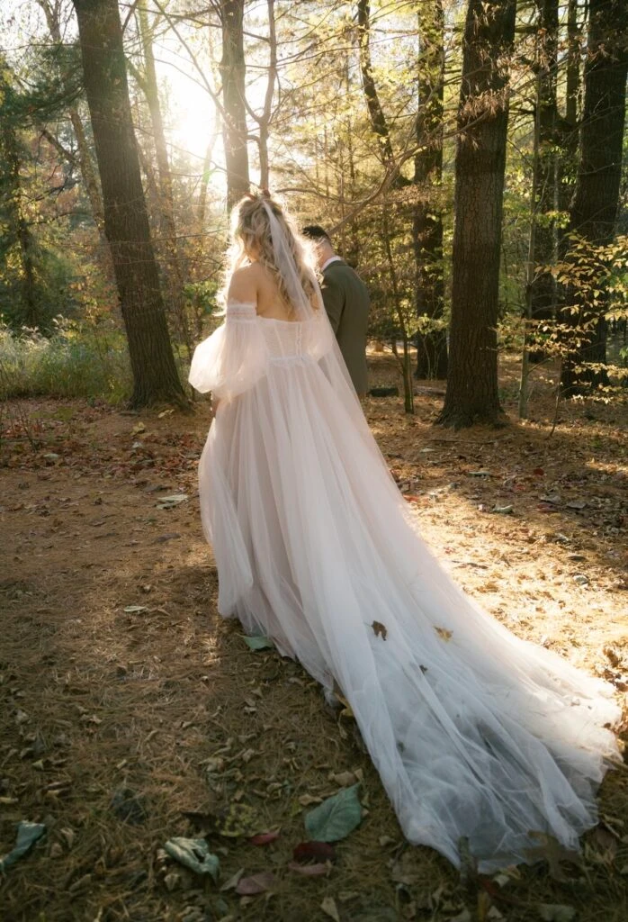 Real bride Sarah posing in her wedding gown