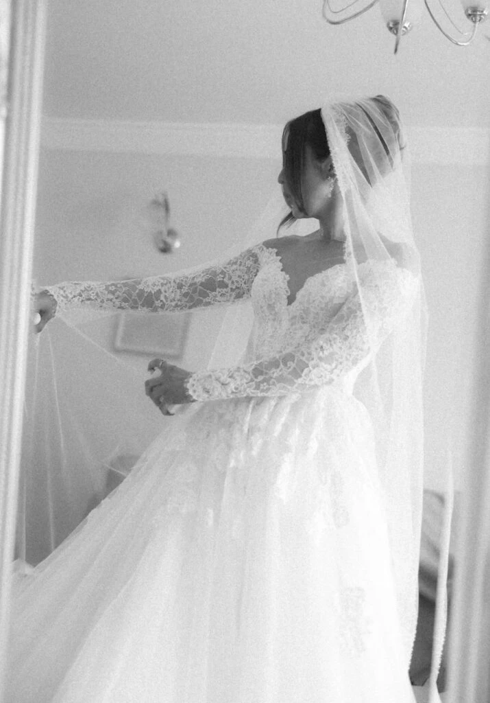 real bride Hannah posing in her wedding gown