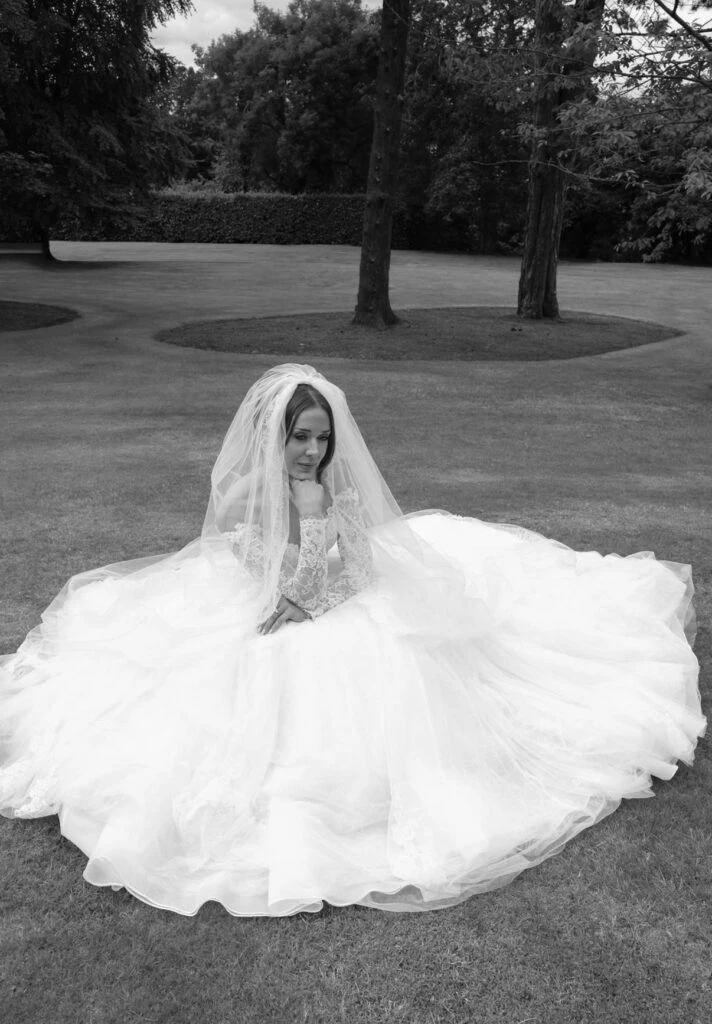 Real bride Hannah posing in her wedding gown