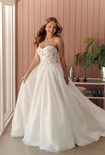Bride wearing basque waist ballgown with strapless corset bodice, Stella York SY8181