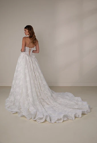 Bride wearing strapless allover lace ballgown with tie-up corset back, Martina Liana Luxe LE1435