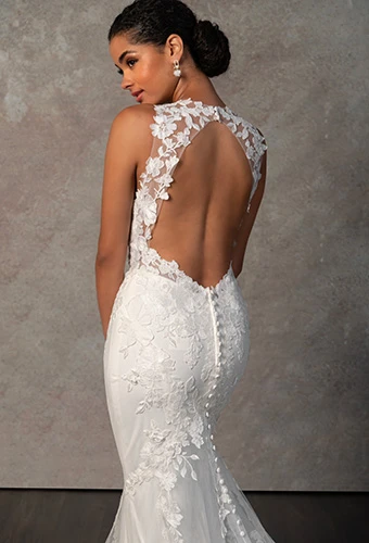 Bride wearing fit-and-flare wedding dress with matte leafy lace detail and keyhole back, Essense of Australia D4141
