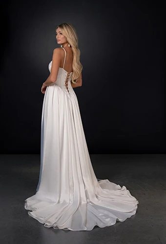 Bride wearing soft A-line wedding dress with tie-up corset back, Martina Liana ML2063