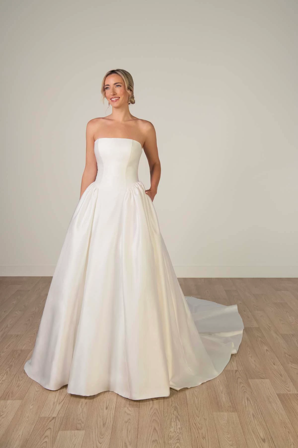 sy8274 Strapless Mikado A-Line Wedding Gown with Architectural Seaming and Pockets by Stella York