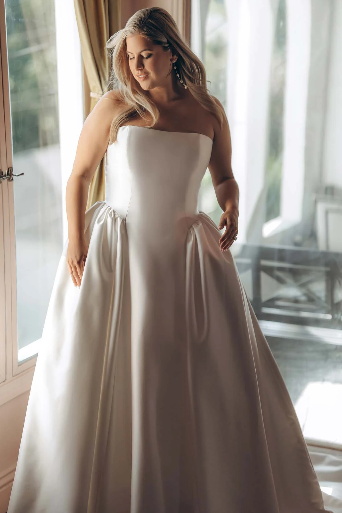 sy8274 Strapless Mikado A-Line Wedding Gown with Architectural Seaming and Pockets by Stella York