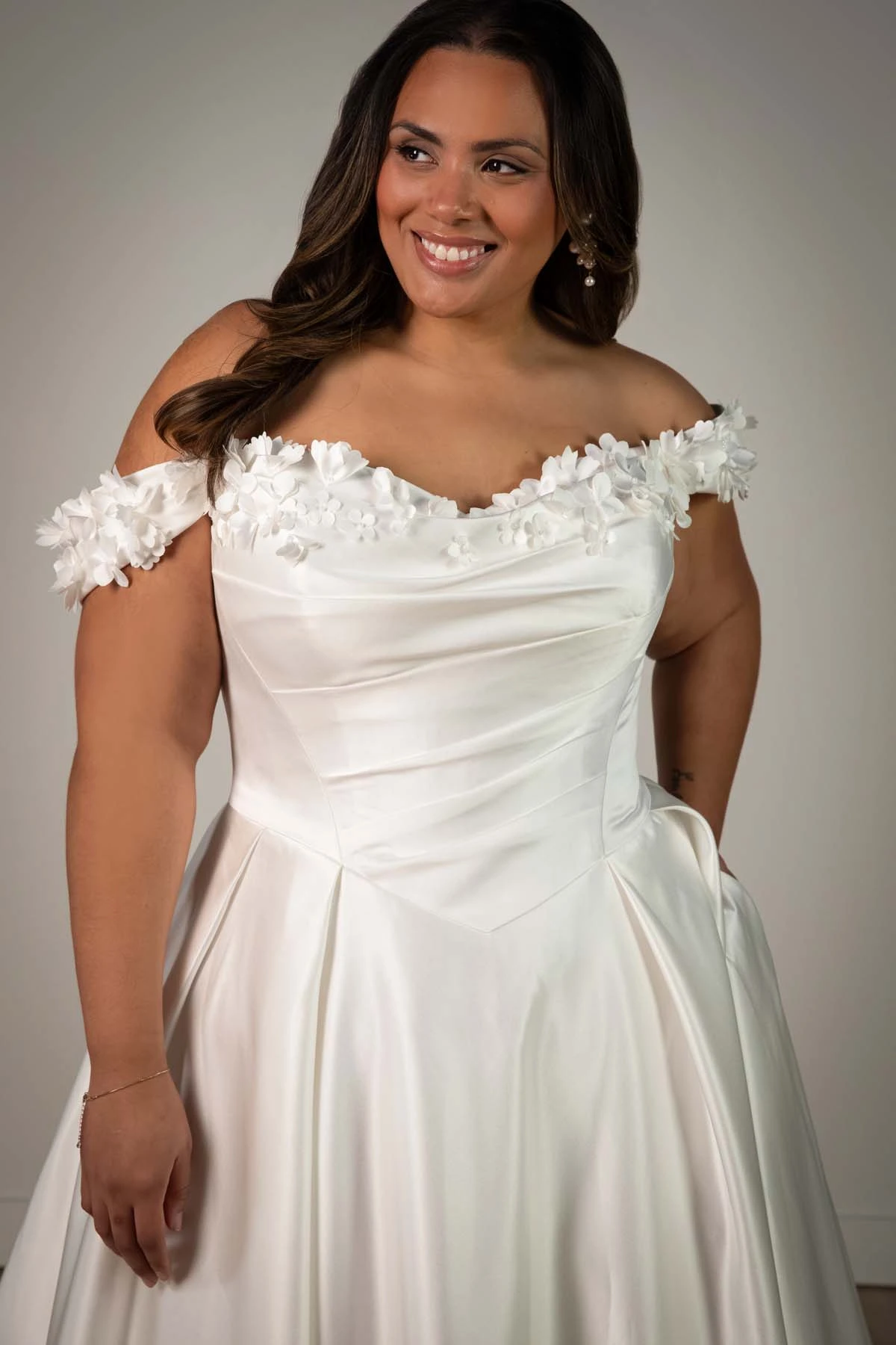 sy8288+ Plus Size Off-the-Shoulder Satin A-Line Wedding Gown with Floral Neckline and Pockets by Stella York