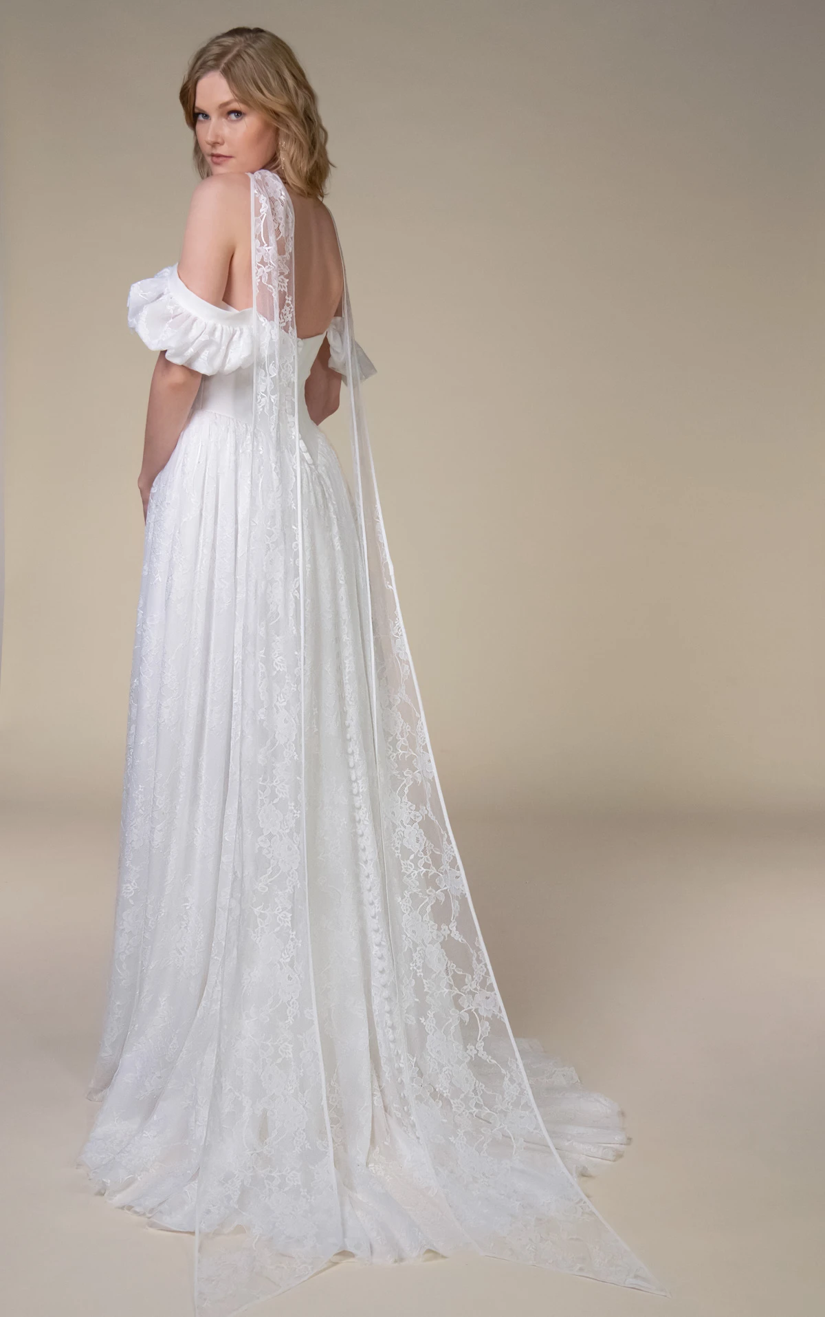 east Off-The-Shoulder Lace and Crepe A-Line Wedding Gown with Detachable Puff Sleeves by All Who Wander