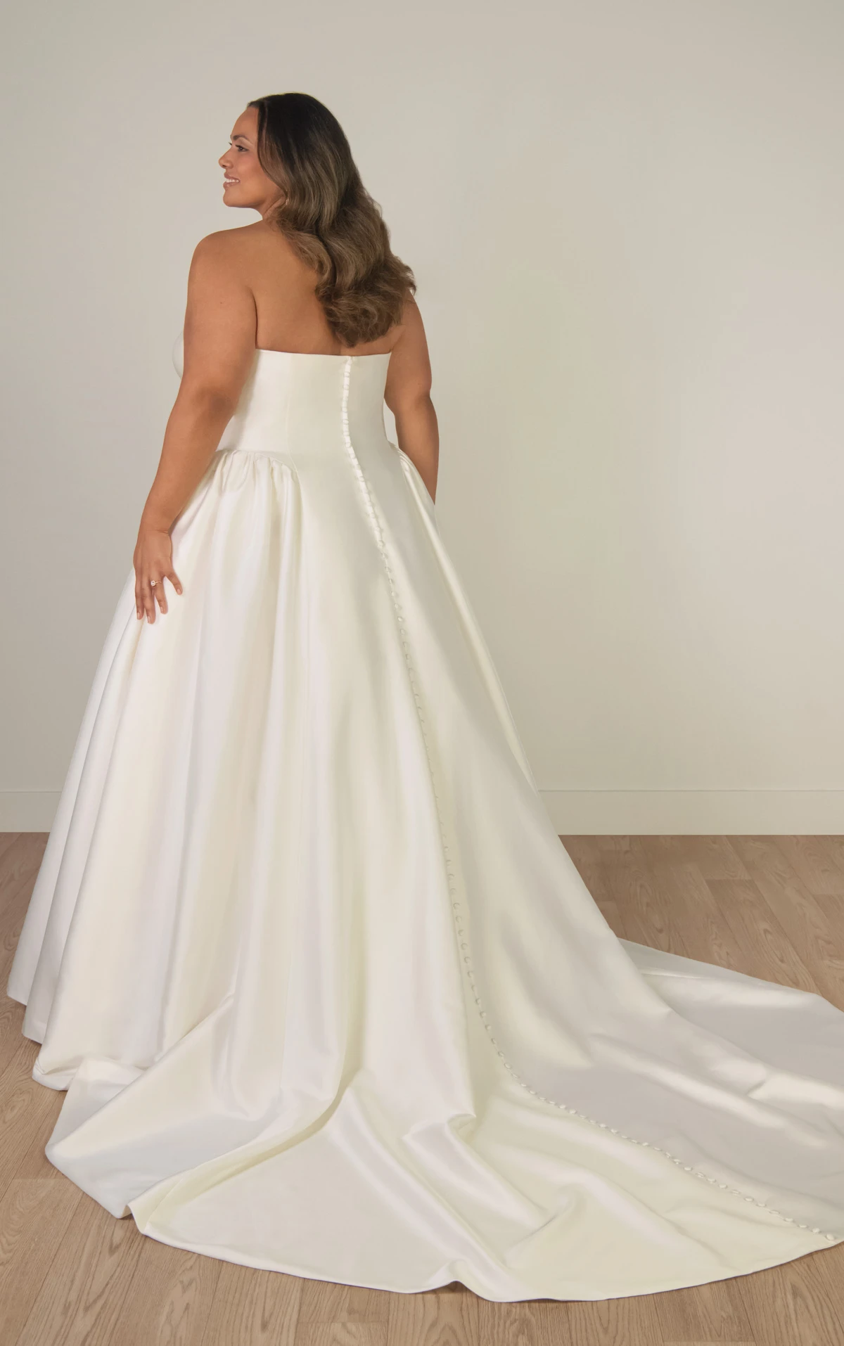 sy8274+ Plus Size Strapless Mikado A-Line Wedding Gown with Architectural Seaming and Pockets by Stella York