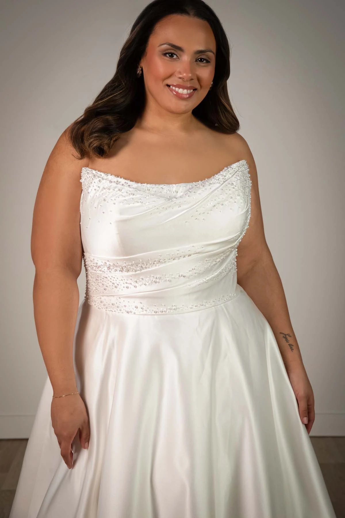 sy8318+ Plus Size Strapless Satin A-Line Wedding Gown with Pearlescent Beading and Pockets by Stella York