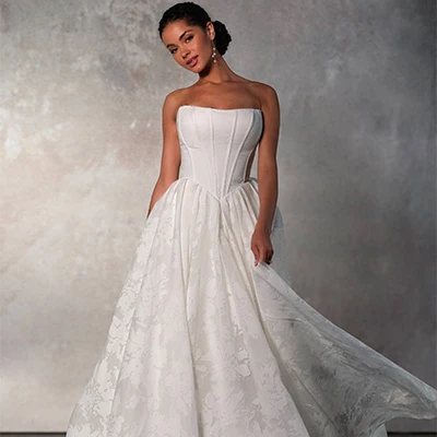 Bride wearing romantic princess strapless ballgown wedding dress