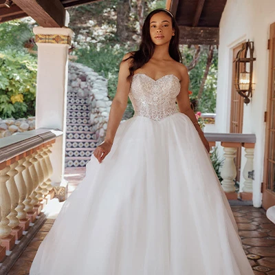 Bride wearing sparkling strapless princess ballgown wedding dress