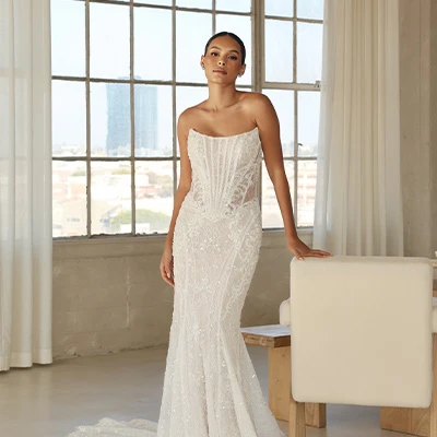 Bride wearing sparkling lace art deco wedding dress
