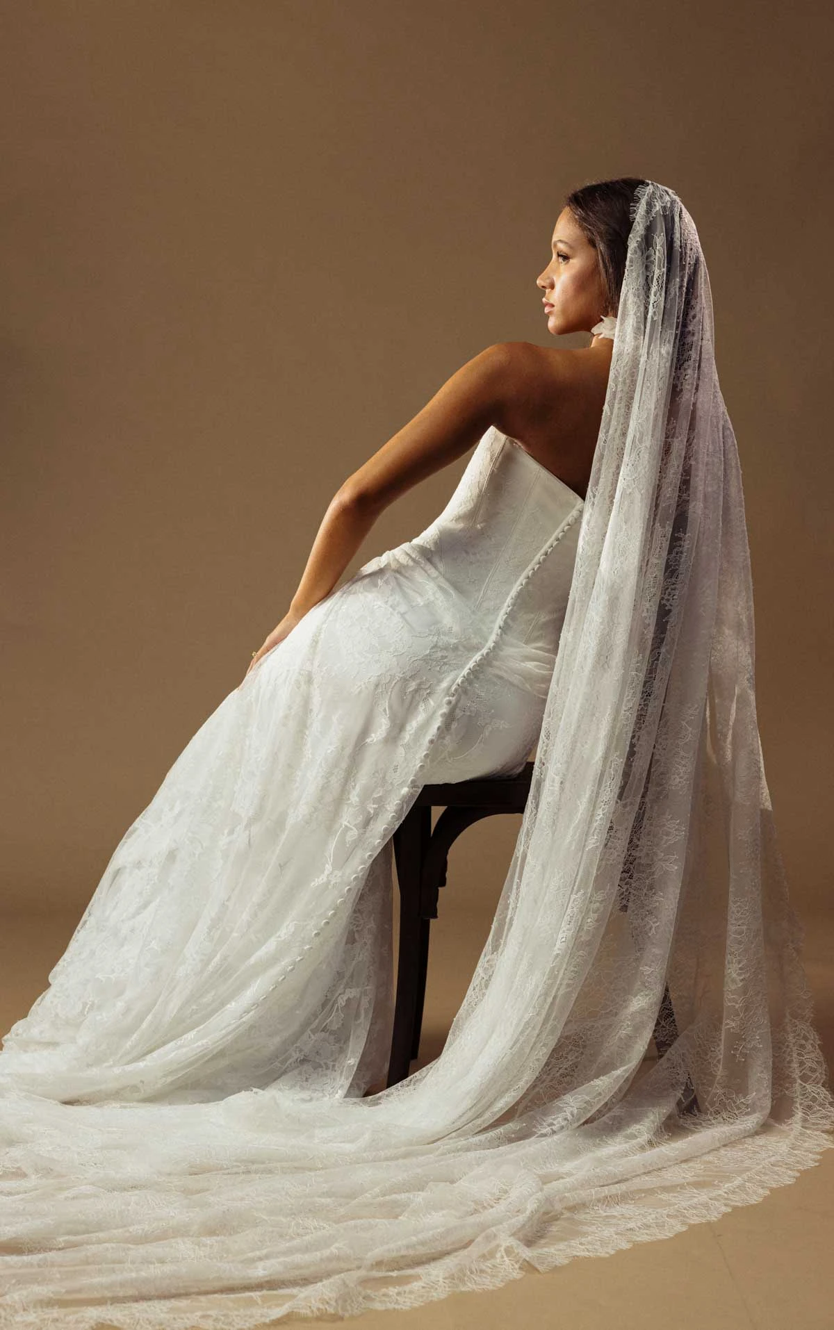 august A-Line Bridal Gown Featuring a Strapless Neckline and Draped Drop Waist  by All Who Wander