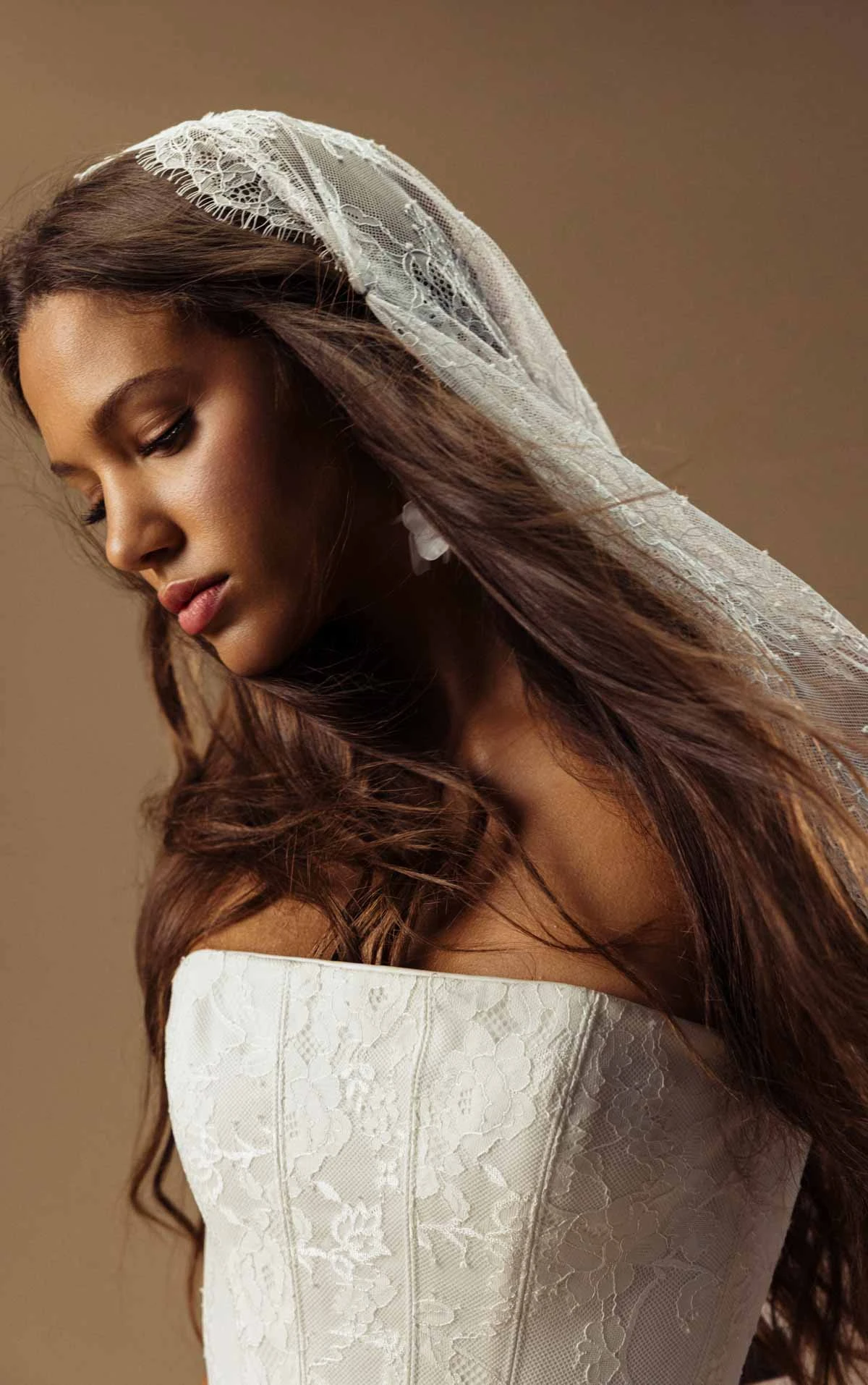 august A-Line Bridal Gown Featuring a Strapless Neckline and Draped Drop Waist  by All Who Wander
