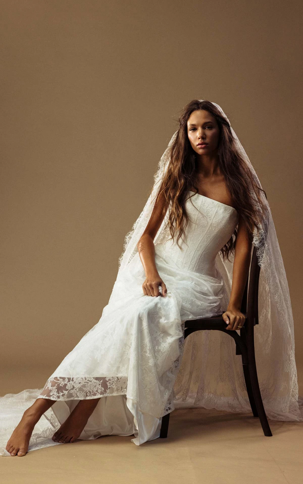 august A-Line Bridal Gown Featuring a Strapless Neckline and Draped Drop Waist  by All Who Wander