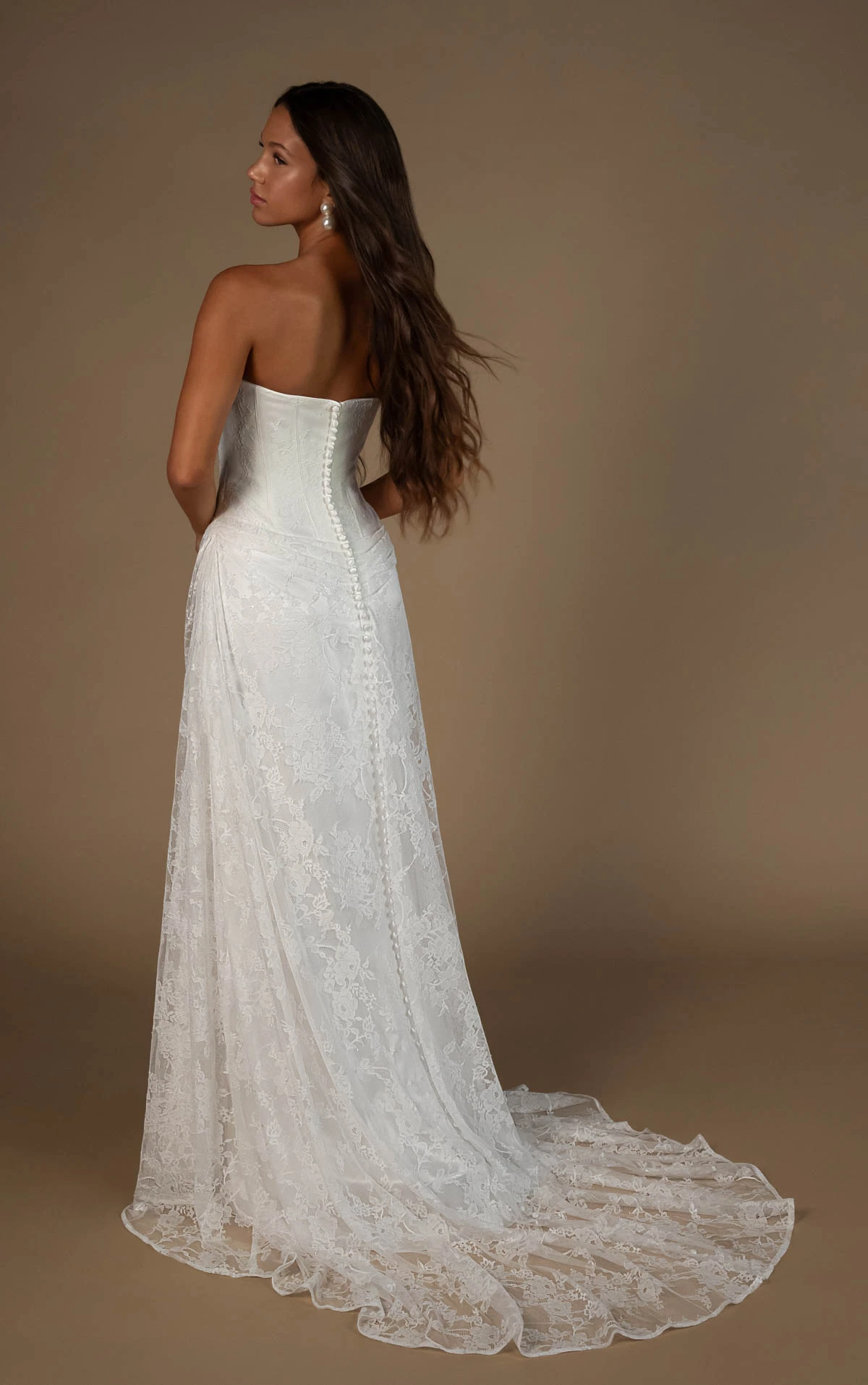 august A-Line Bridal Gown Featuring a Strapless Neckline and Draped Drop Waist  by All Who Wander