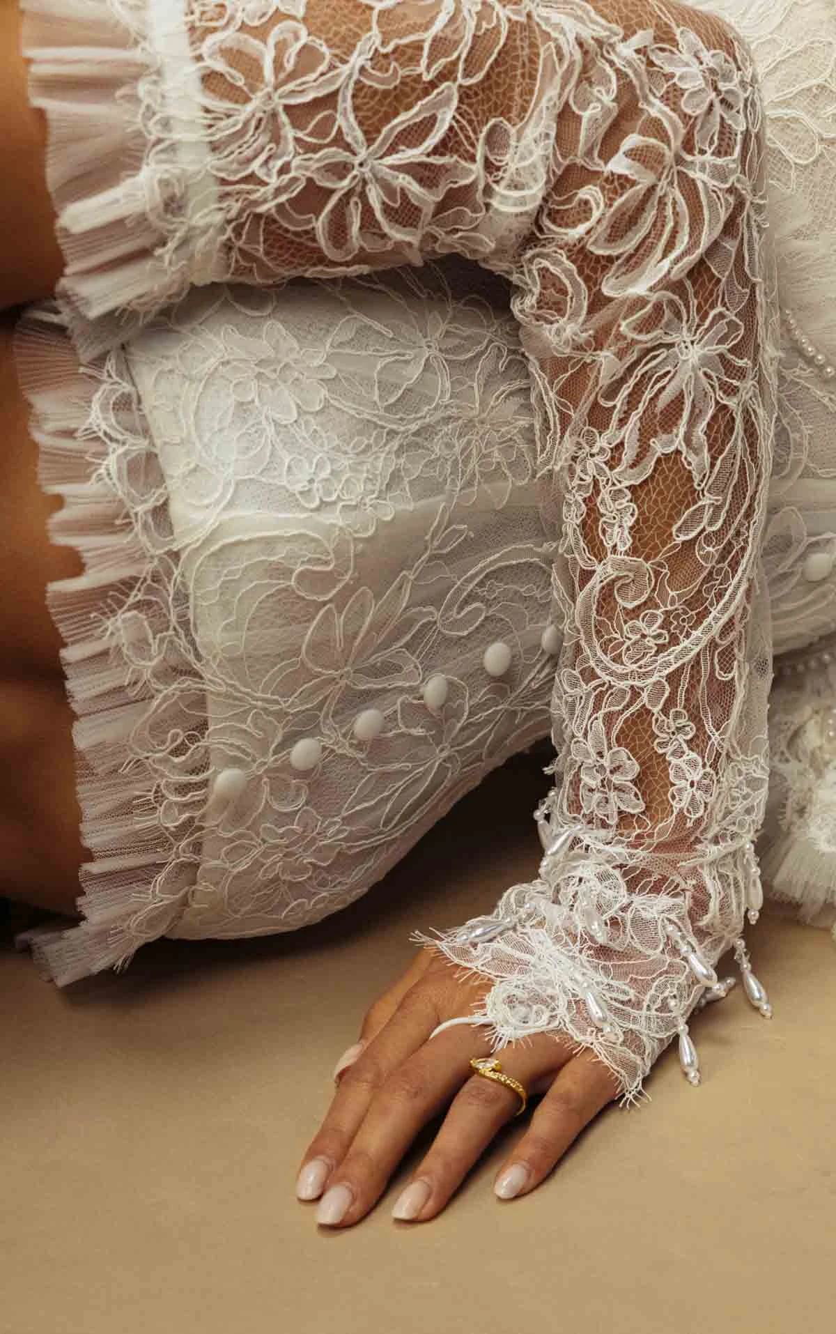 landon Lace Sheath Wedding Dress with a Strapless Neckline and Detachable Long Sleeves  by All Who Wander