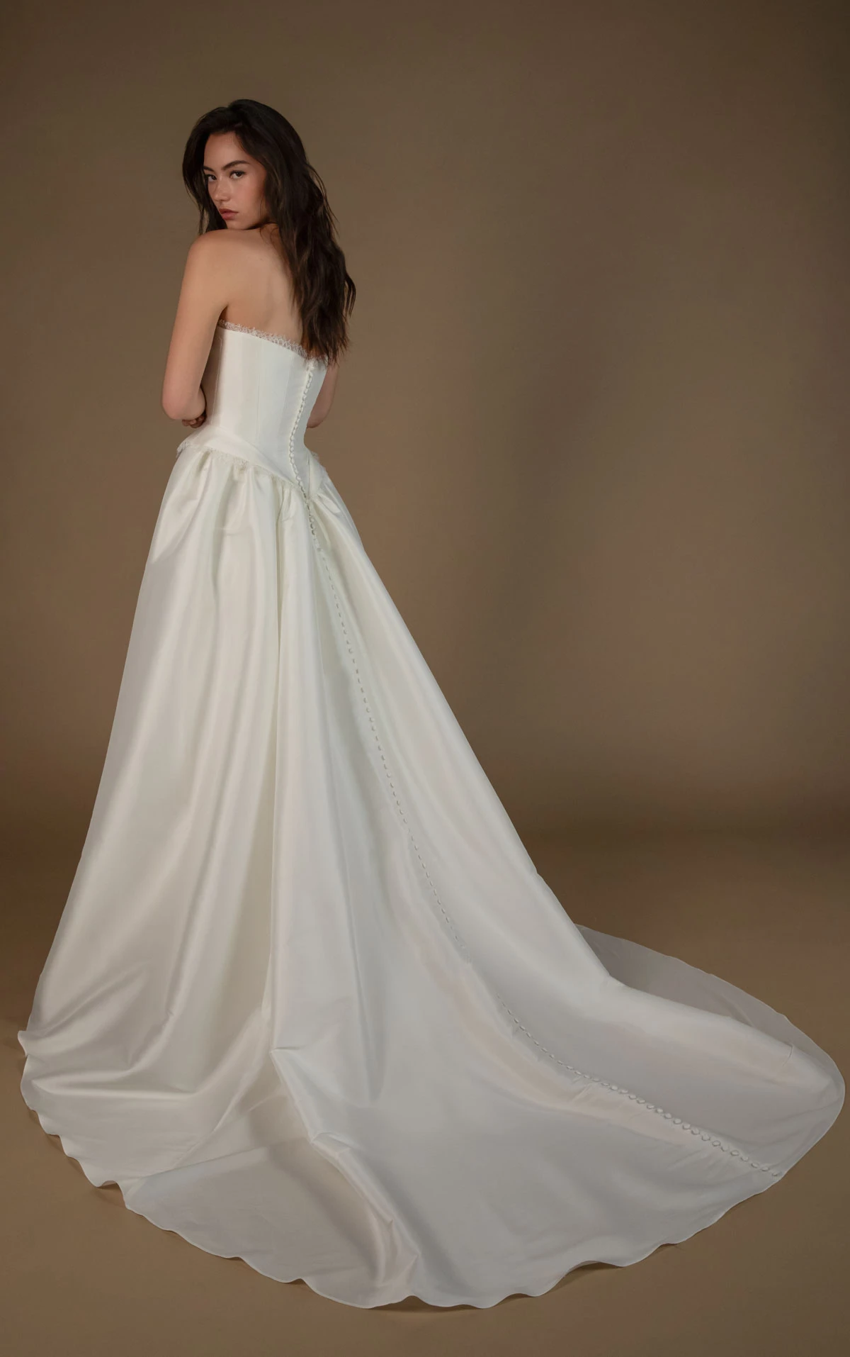 lynlee Strapless A-Line Wedding Dress in Smooth Taffeta with a Basque Waist  by All Who Wander