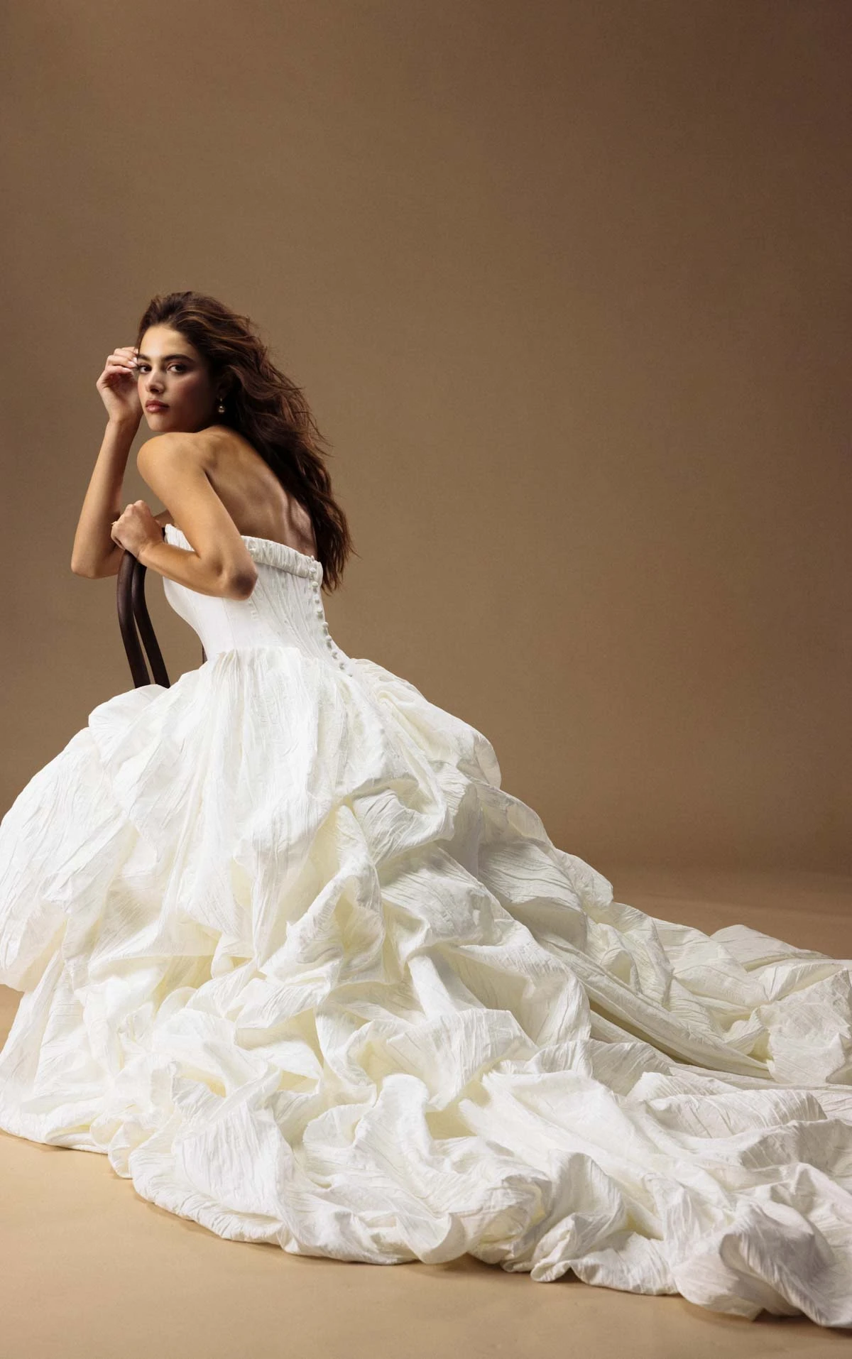 onyx A-Line Wedding Dress with a Pointed Basque Waist and Voluminous Pickup Skirt  by All Who Wander