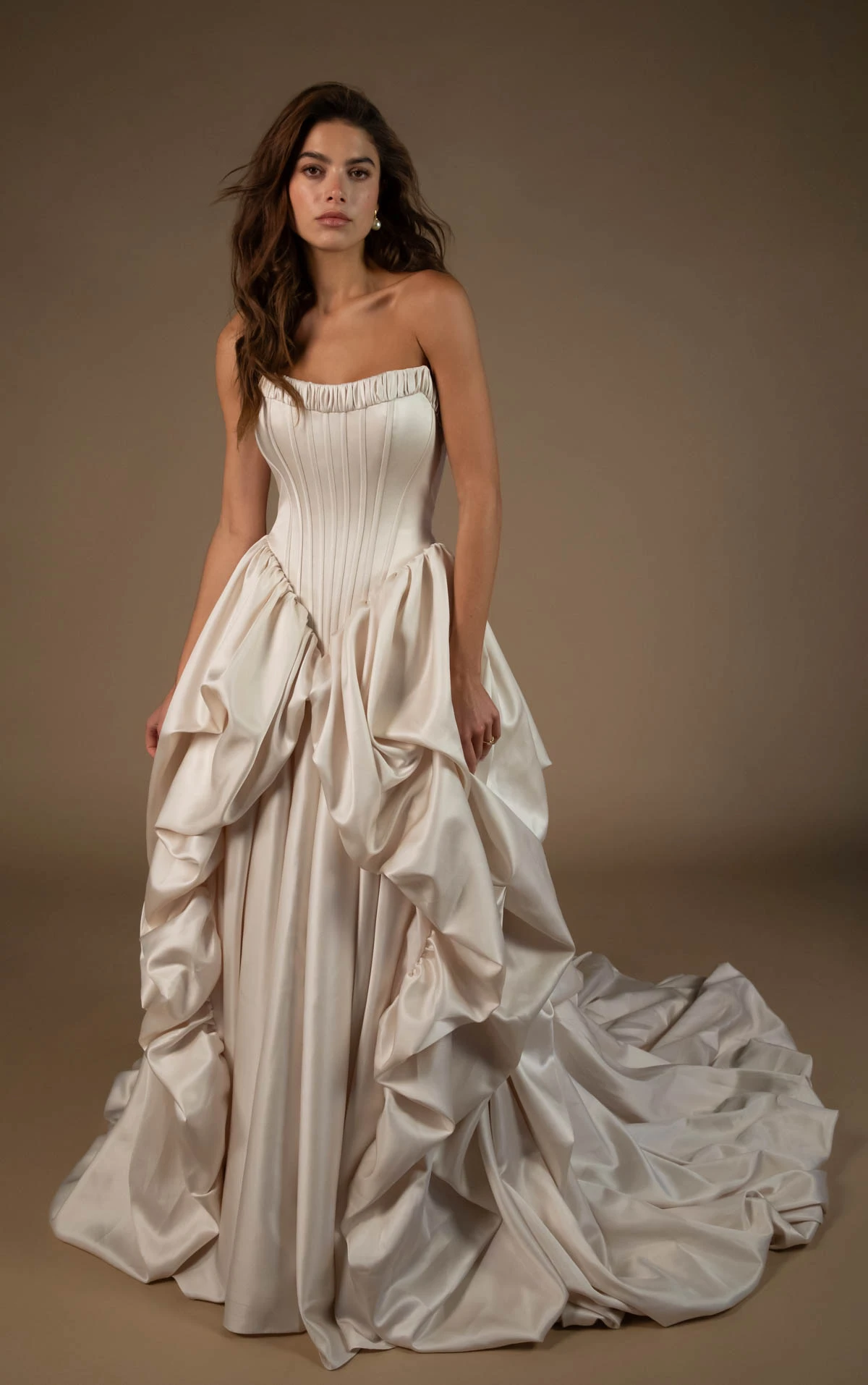 onyx-lgd A-Line Bridal Gown Featuring a Basque Waist and Dramatic Pickup Detailing  by All Who Wander
