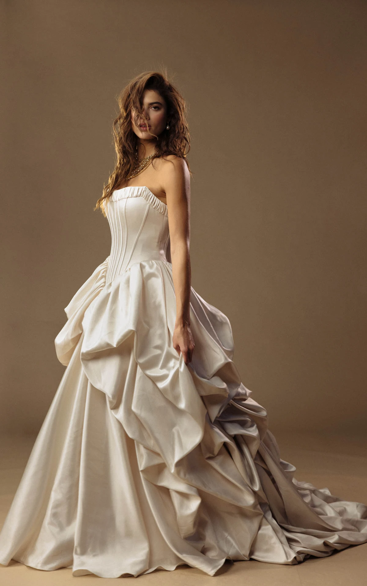 onyx-lgd A-Line Bridal Gown Featuring a Basque Waist and Dramatic Pickup Detailing  by All Who Wander